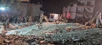 Police personnel during a rescue operation after a multi-storey building collapsed at Sohana village, Punjab